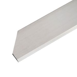 Angled close up view of a Meat Skinner Blade for Maja Model 913-125N, with dimensions 554mm x 22mm x .7mm, Stainless Steel, with a right side Chamfer.