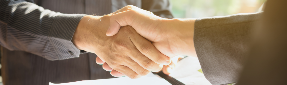 two people shaking hands